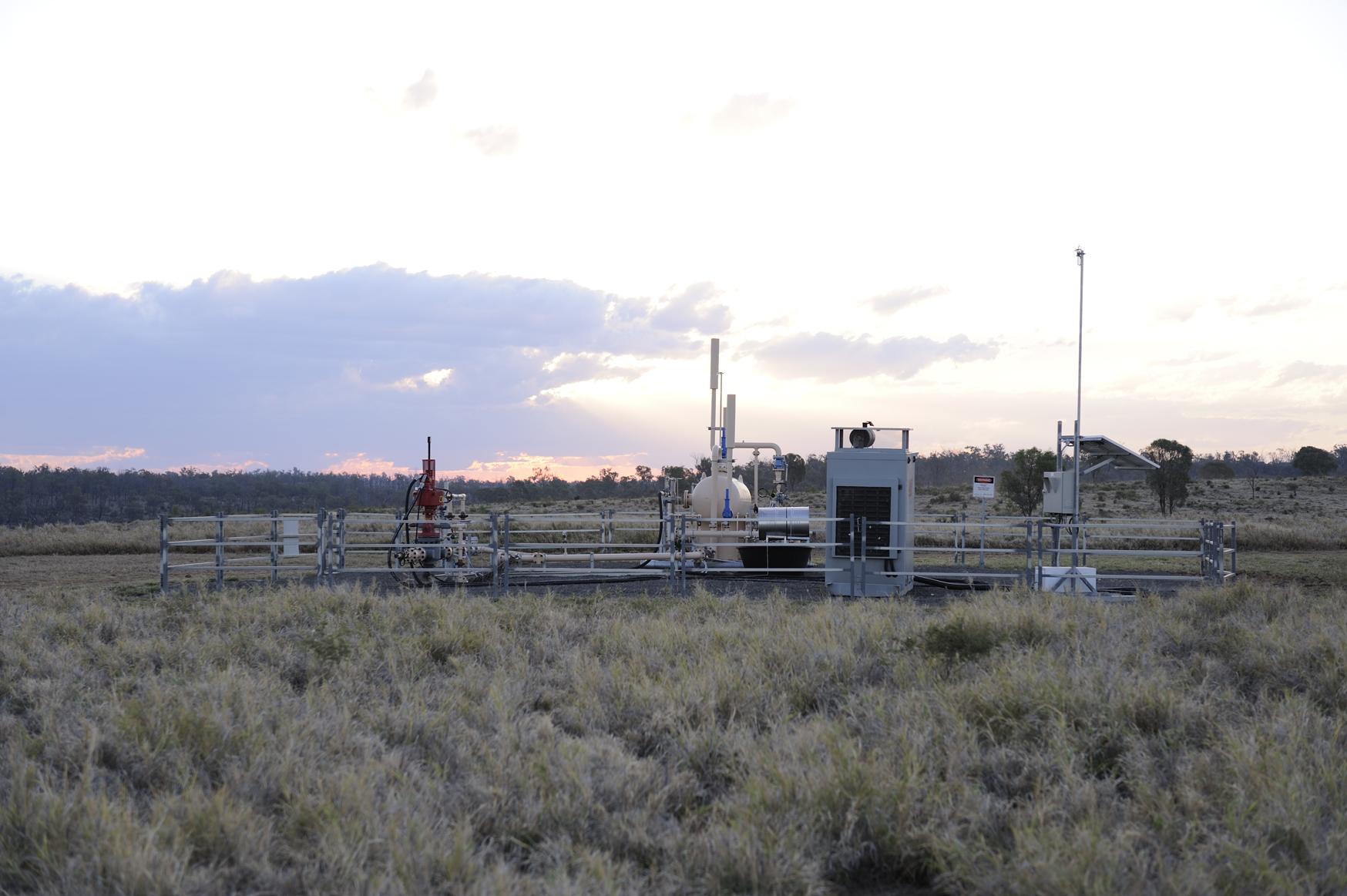 gas well in sunset